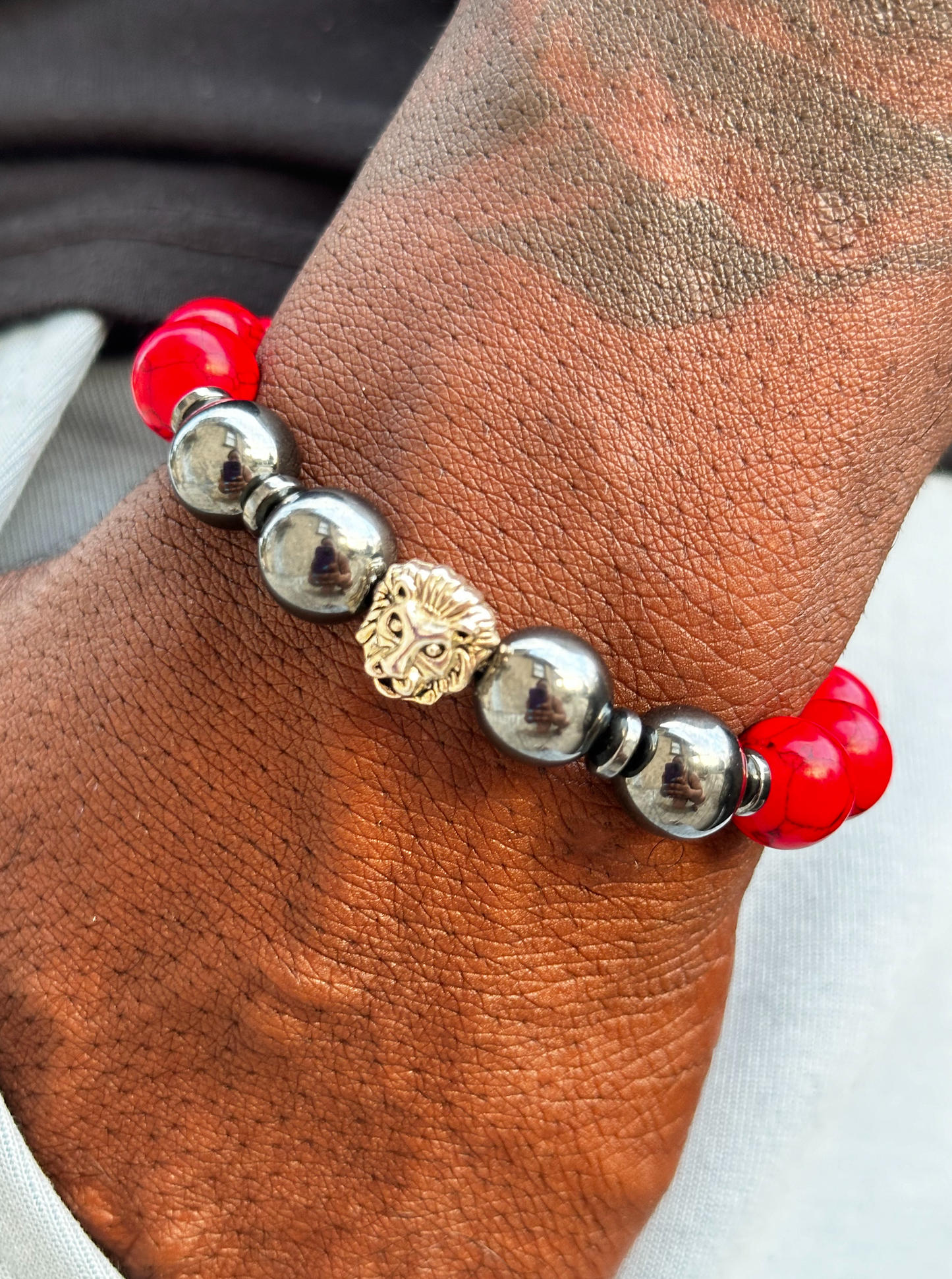 Red Turquoise and Black Hematite Bracelet with Lion Charm